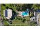 Overhead view showcasing the pool, nearby building, and the green space surrounding it at 1601 43Rd N St # 226, St Petersburg, FL 33713