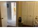 Hallway with a bathroom on the left and closet on the right at 1601 43Rd N St # 226, St Petersburg, FL 33713