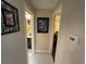 Hallway with a tiled floor and bathroom visible on the left at 1601 43Rd N St # 226, St Petersburg, FL 33713