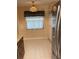 Eat-in kitchen with pantry, tile floors, and a pendant light at 1601 43Rd N St # 226, St Petersburg, FL 33713