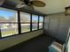 Bright sunroom with large windows at 1601 43Rd N St # 226, St Petersburg, FL 33713