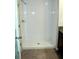 Tiled shower with tiled base and glass door in bathroom at 17152 Sunshine Mimosa St, Wimauma, FL 33598