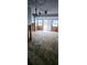 Open living room with plywood flooring, great natural light, and a doorway view at 1743 Maryland Ne Ave, St Petersburg, FL 33703