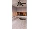 Bright living room with tile flooring and a ceiling fan at 1743 Maryland Ne Ave, St Petersburg, FL 33703