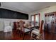Elegant dining room with hardwood floors, formal furnishings, and classic decor at 18715 Lakeshore Dr, Lutz, FL 33549