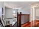 Bright foyer featuring a decorative chandelier and hardwood floors, adding a touch of elegance to the home at 18715 Lakeshore Dr, Lutz, FL 33549