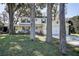 Charming two-story home featuring a welcoming front porch and attached garage at 18715 Lakeshore Dr, Lutz, FL 33549