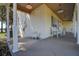 Inviting front porch with comfortable seating, ideal for relaxing outdoors at 18715 Lakeshore Dr, Lutz, FL 33549