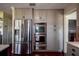 Stainless steel appliances including refrigerator, oven, microwave, and custom cabinets in a modern kitchen at 18715 Lakeshore Dr, Lutz, FL 33549