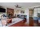 Spacious living room boasts a cozy brick fireplace, stylish decor, and comfortable seating for relaxing at 18715 Lakeshore Dr, Lutz, FL 33549