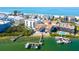 Breathtaking aerial view of this waterfront property, boasting private docks and beach access at 19937 Gulf Blvd # B-3, Indian Shores, FL 33785