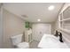 Modern bathroom features updated fixtures, vanity, toilet, and decor creating a serene and refreshing space at 19937 Gulf Blvd # B-3, Indian Shores, FL 33785