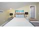 Beautiful bedroom featuring a queen bed, stylish decor, and ample natural light, creating a relaxing ambiance at 19937 Gulf Blvd # B-3, Indian Shores, FL 33785