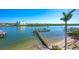 Picturesque view of the private dock and tranquil, clear water surrounding this waterfront property at 19937 Gulf Blvd # B-3, Indian Shores, FL 33785