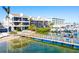 Scenic view of the waterfront with a private boat dock for easy access to the water and nearby waterways at 19937 Gulf Blvd # B-3, Indian Shores, FL 33785