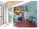 Bright living space showcasing an open floor plan, connecting the living room, kitchen, and dining area at 19937 Gulf Blvd # B-3, Indian Shores, FL 33785