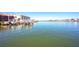 Picturesque waterfront views with direct access to boat docks from this stunning property at 19937 Gulf Blvd # B-3, Indian Shores, FL 33785