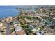 An aerial view of a neighborhood with a bay view, showing residential properties and their proximity to the waterfront at 266 44Th Ave, St Pete Beach, FL 33706