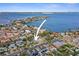 An aerial view highlights the location of the property within the waterfront community, close to the bay and neighborhood at 266 44Th Ave, St Pete Beach, FL 33706