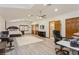 Large bedroom featuring wood floors, neutral walls, and closet access at 2660 Powell Ln, Tarpon Springs, FL 34688