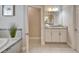 Charming bathroom with granite countertops, tiled floors, and a separate water closet at 2911 Silva Wood Dr, Valrico, FL 33596