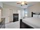 Comfortable bedroom features a ceiling fan, a large closet, and a window with a built-in bench at 2911 Silva Wood Dr, Valrico, FL 33596