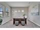 Cozy home office with a modern desk, neutral carpet, and ample natural light at 2911 Silva Wood Dr, Valrico, FL 33596