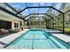 Wonderful, screened-in pool and outdoor living area with ample space at 2911 Silva Wood Dr, Valrico, FL 33596