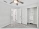 Cozy bedroom featuring a closet with built-in shelving and drawers at 3184 Cypress Green Dr, Palm Harbor, FL 34684