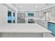 Modern kitchen featuring quartz countertops, stainless steel appliances, and ample cabinet space at 3184 Cypress Green Dr, Palm Harbor, FL 34684