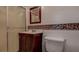 Cozy bathroom featuring a stand up shower and single sink vanity at 3438 Bigelow Dr, Holiday, FL 34691