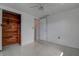 View of a closet with custom built-ins off of a bedroom at 3438 Bigelow Dr, Holiday, FL 34691