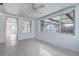 Bright bedroom featuring large windows that flood the space with light, enhancing the airy and open feel of the room at 3438 Bigelow Dr, Holiday, FL 34691