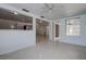 Open-concept living area seamlessly connecting various rooms, enhancing spaciousness and promoting effortless interaction at 3438 Bigelow Dr, Holiday, FL 34691