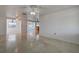 Bright and airy living room featuring neutral walls, polished floors, and an open layout perfect for entertaining at 3438 Bigelow Dr, Holiday, FL 34691