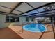Inviting pool area featuring a covered patio and a well maintained pool at 3438 Bigelow Dr, Holiday, FL 34691
