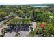 Beautifully maintained property with mature trees, a parking lot, and lush landscaping at 4031 Bluff Oak Ct, Palm Harbor, FL 34684