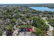 Discover the property's serene setting near a lake, surrounded by lush greenery and established landscaping at 4031 Bluff Oak Ct, Palm Harbor, FL 34684