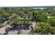 An aerial view of the property and surrounding lush landscaping at 4031 Bluff Oak Ct, Palm Harbor, FL 34684