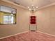 Bright dining room with wood floors and a view into the Gathering room at 4031 Bluff Oak Ct, Palm Harbor, FL 34684
