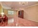 Bright living room with hardwood floors, a ceiling fan, and a view of the outdoors at 4031 Bluff Oak Ct, Palm Harbor, FL 34684