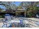 Relax by the pool at the cabana with comfortable seating at 4031 Bluff Oak Ct, Palm Harbor, FL 34684