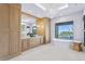 A luxurious bathroom featuring dual vanities, a freestanding tub, and a serene waterfront view at 48 Sandpiper Rd, Tampa, FL 33609