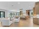 Modern kitchen with a large island, stylish pendant lighting, and stainless steel appliances at 48 Sandpiper Rd, Tampa, FL 33609