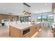 Modern kitchen with an island and a connecting living room at 48 Sandpiper Rd, Tampa, FL 33609
