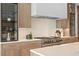 Modern kitchen featuring a stainless steel range and sleek countertops and cabinetry at 48 Sandpiper Rd, Tampa, FL 33609