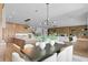 Open floor plan showcasing the kitchen, dining area, living room, and staircase, ideal for modern living at 48 Sandpiper Rd, Tampa, FL 33609
