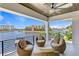 Spacious patio featuring lounge seating and waterfront views at 48 Sandpiper Rd, Tampa, FL 33609