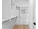Spacious walk-in closet with ample shelving and hanging space, offering abundant storage options at 48 Sandpiper Rd, Tampa, FL 33609