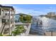 A waterfront property with great space to entertain in the pool area and by the dock at 48 Sandpiper Rd, Tampa, FL 33609